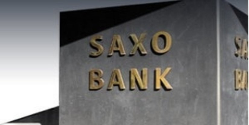 Saxo Bank: Полсон не потерял интерес к золоту