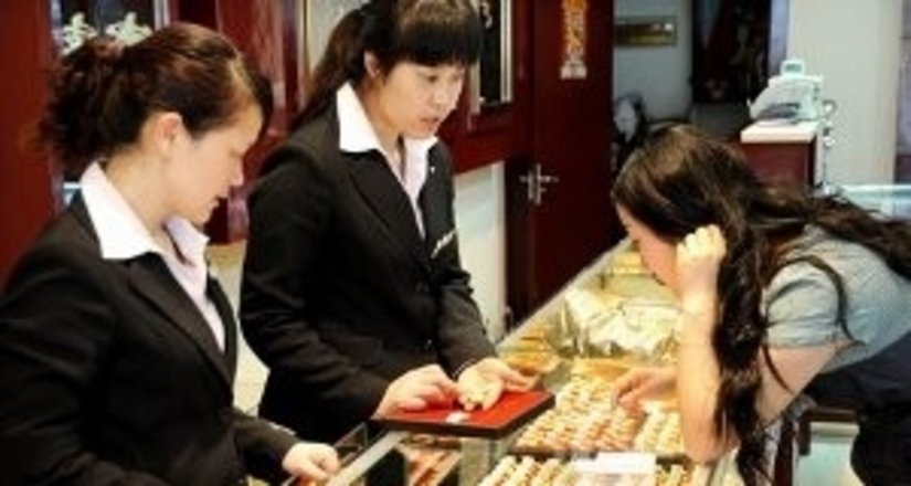Домохозяйства Китая поддержали цены на золото