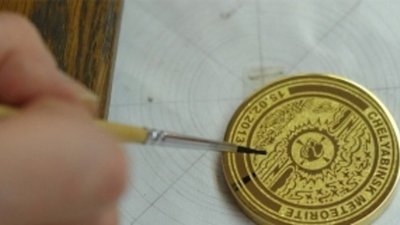 Сувенирные медали к Олимпиаде инкрустируют осколками метеорита