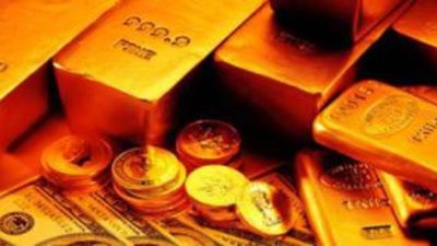 Золото дешевеет на фоне курса американского доллара