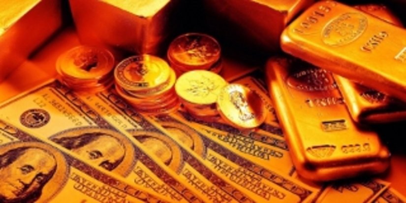 Спотовые цены на золото упали почти на 1 %