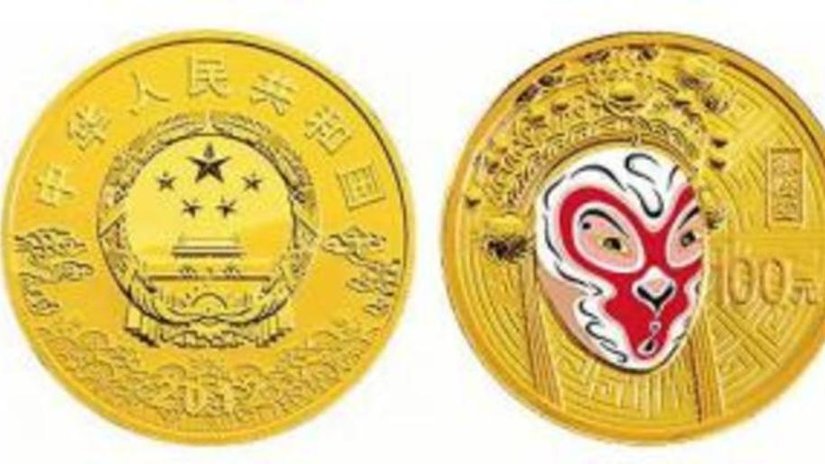 На китайской монете – театральная маска