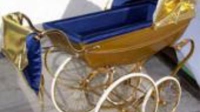 Детская коляска из золота