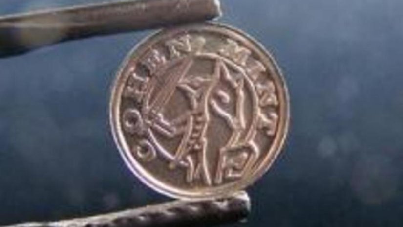 Первые в мире монеты из родия