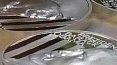 Барака Обаму отчеканили на монете 