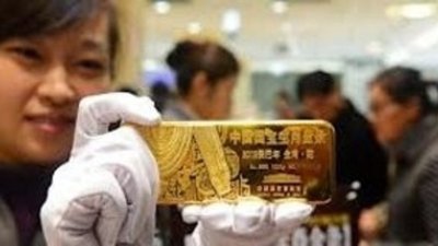 Резервы КНР превысили мировой запас золота вдвое
