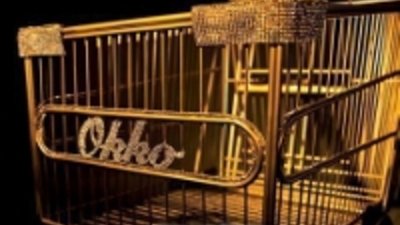 Тележка для покупок из золота с бриллиантами