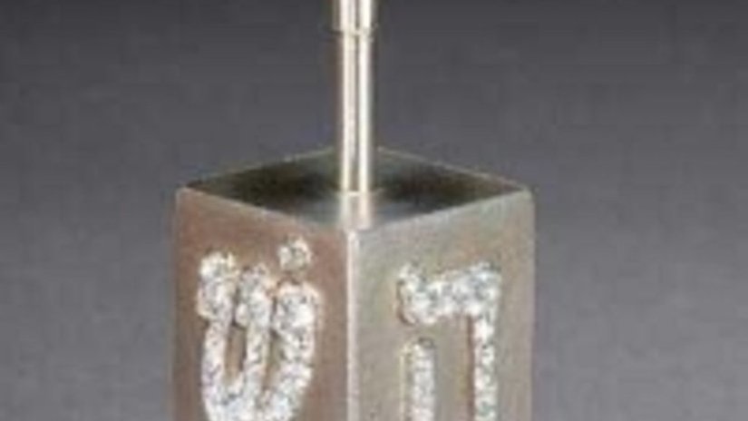 Первый в мире дрейдл украшен бриллиантами