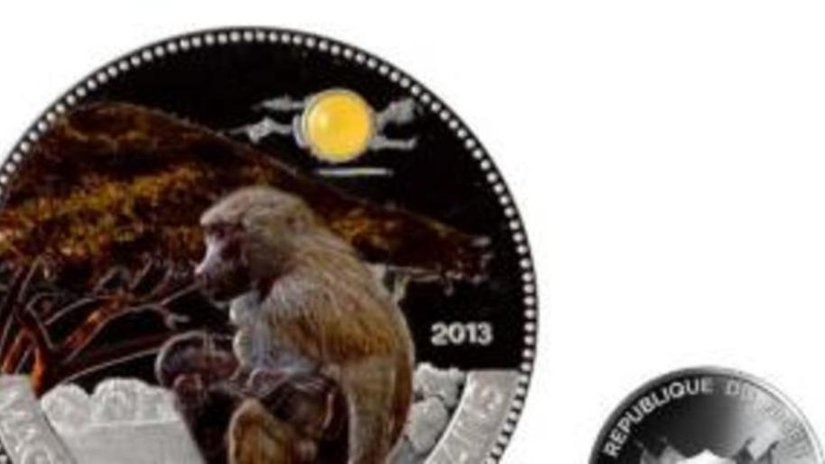 Желтый агат помещен на монету «Оливковый бабуин»