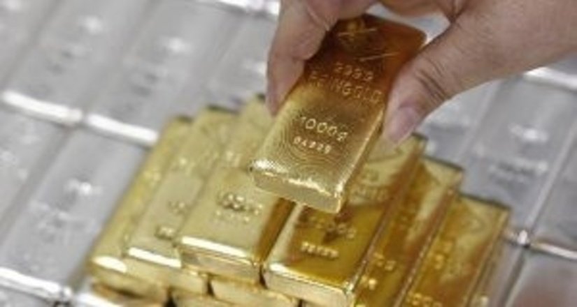 Рынок фьючерсов сдерживает рост золота и серебра