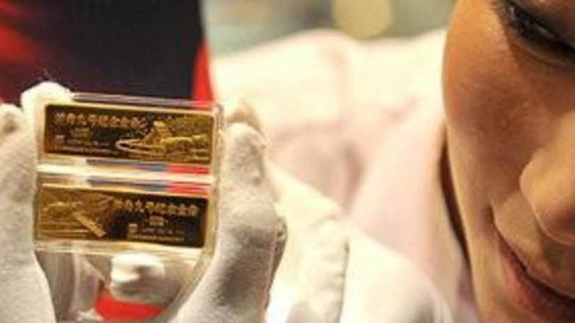 Китай запустил торговлю золотом между банками