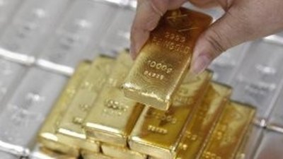 Рынок фьючерсов сдерживает рост золота и серебра