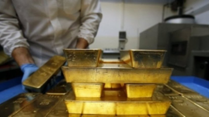 Аналитики ожидают снижения цены золота в 2014 г.
