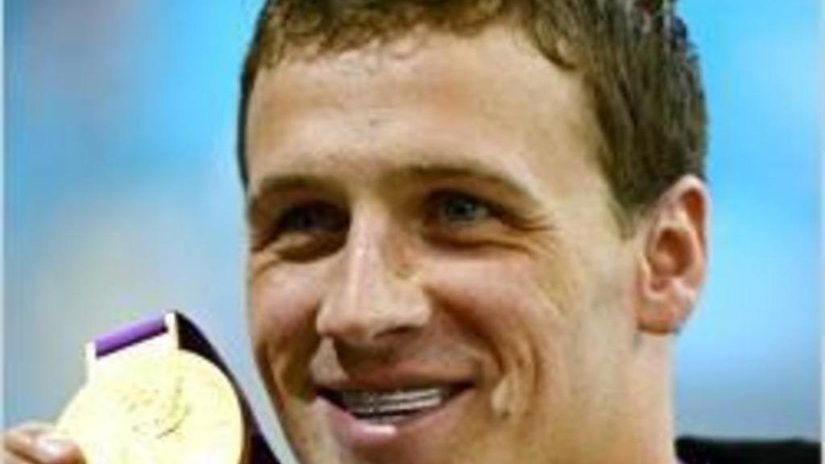 Олимпийский чемпион поразил всех бриллиантовой улыбкой