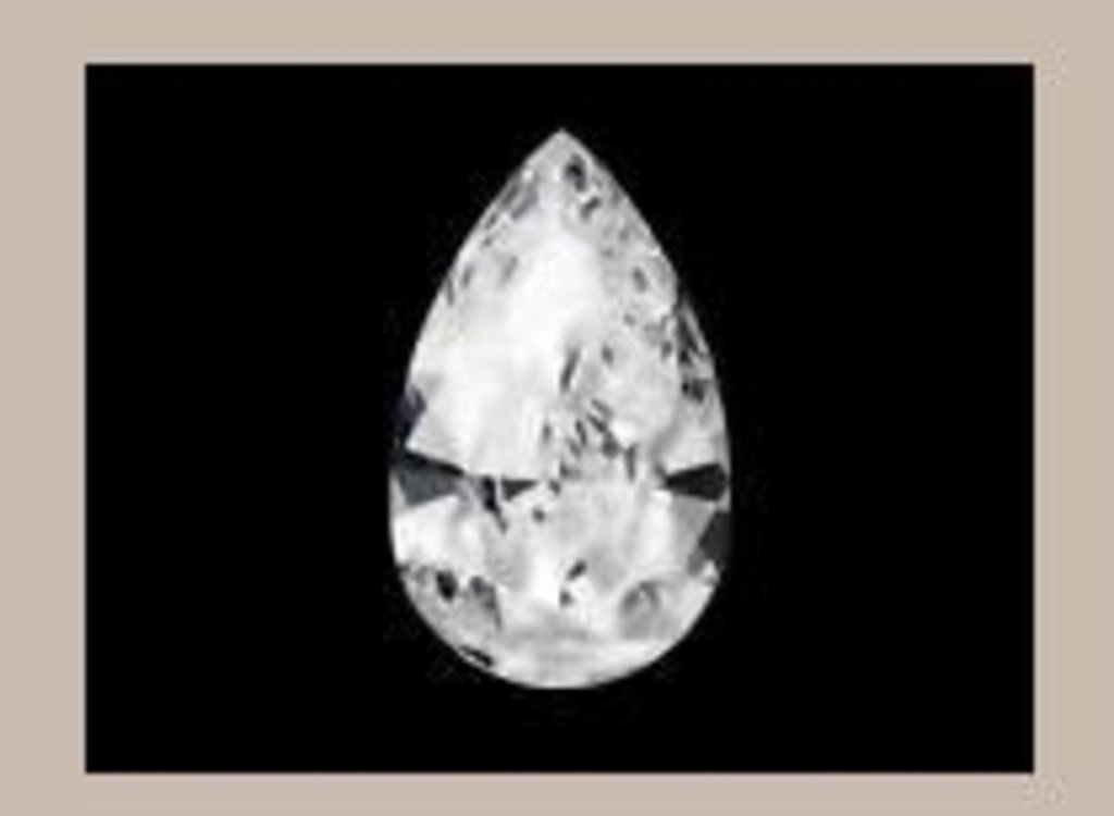Что прочнее алмаза. Круглый серый синими пятнами метеорит Алмаз.