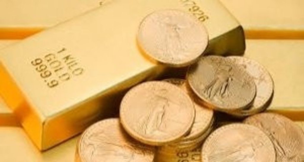 Золото потеряло почти всю доходность 2014 года